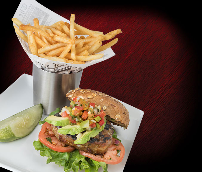 New menu at Longwood Grille and Bar featuring a turkey burger topped with ripe avocado, fresh salsa, crisp lettuce, and juicy tomatoes.